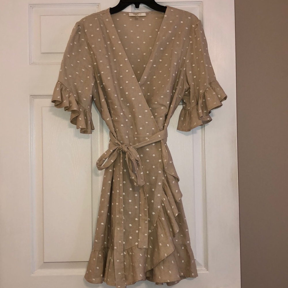 Neutral white polka dot wrap ruffle dress